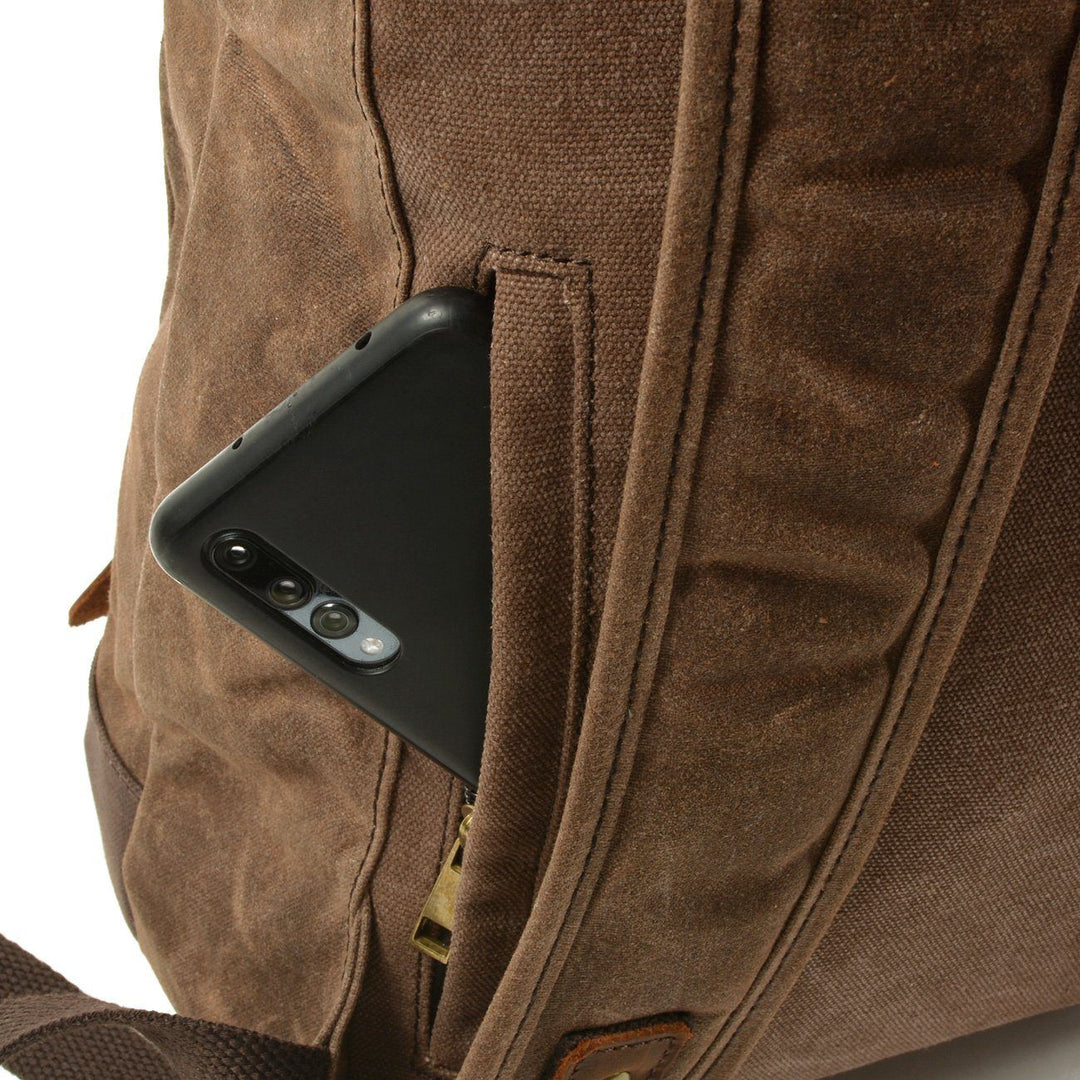 Lennox | Robuster Rolltop-Rucksack aus Canvas und Leder